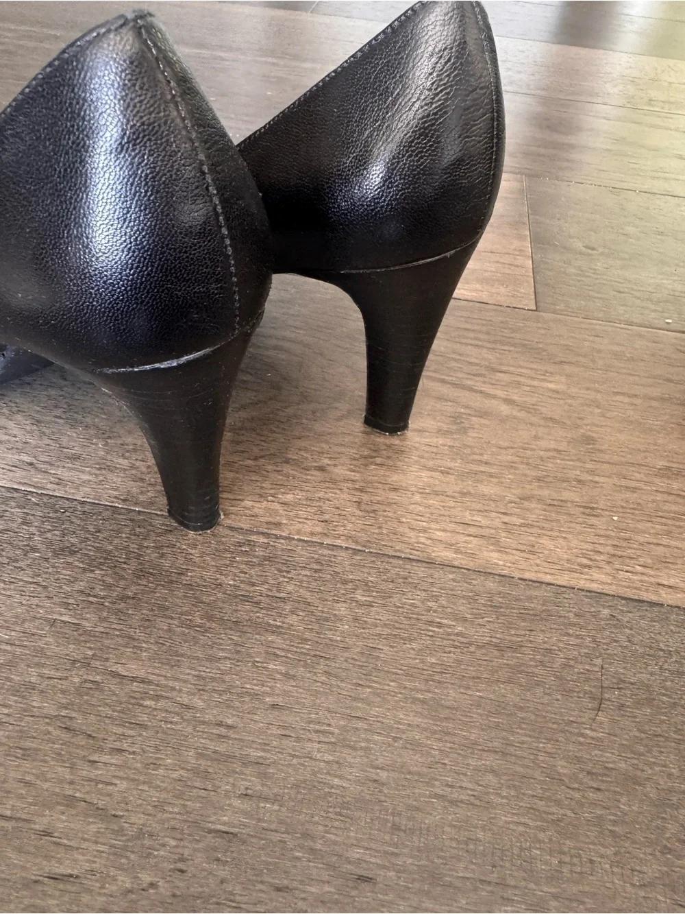 Franco Sarto Black Leather Fringe Pumps with Gold Bar